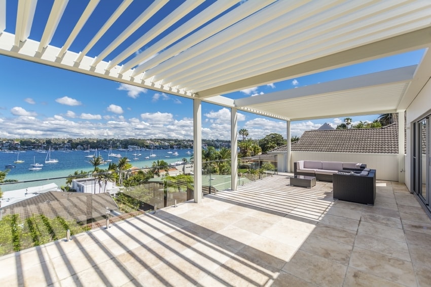 White pergola with aluminum roof