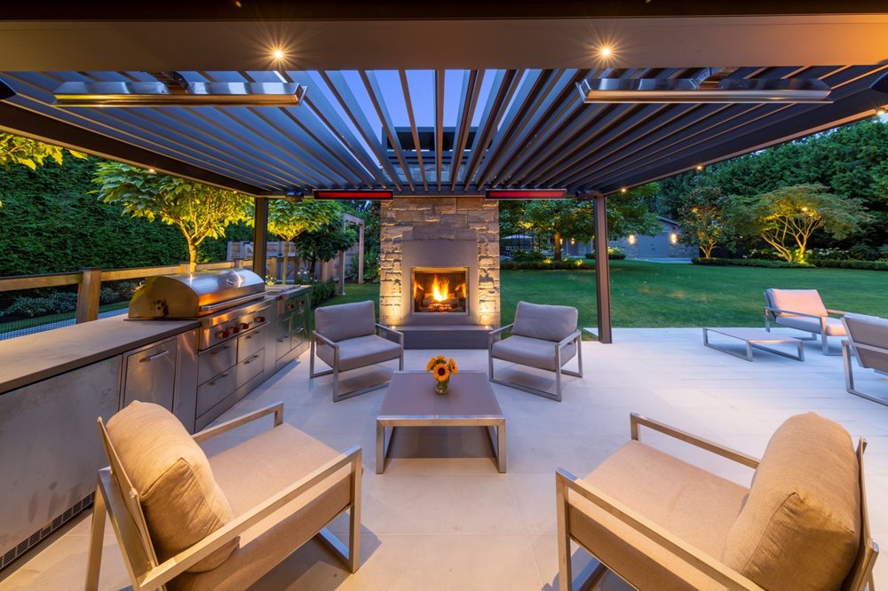 Aluminum pergola with outdoor kitchen and fire pit.